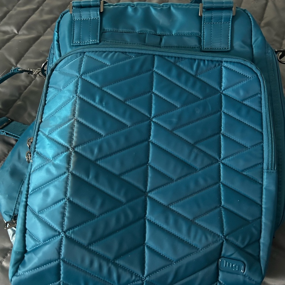 Log Quilted Blue Backpack